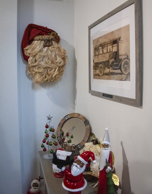 An extensive collection of African American Santas is among the historical photographs from the Daisey family.